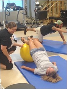 Physical Therapist Assistant working with patient