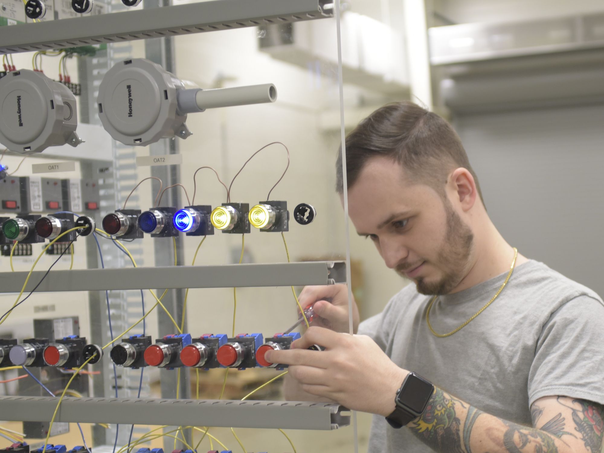 Student working with metal