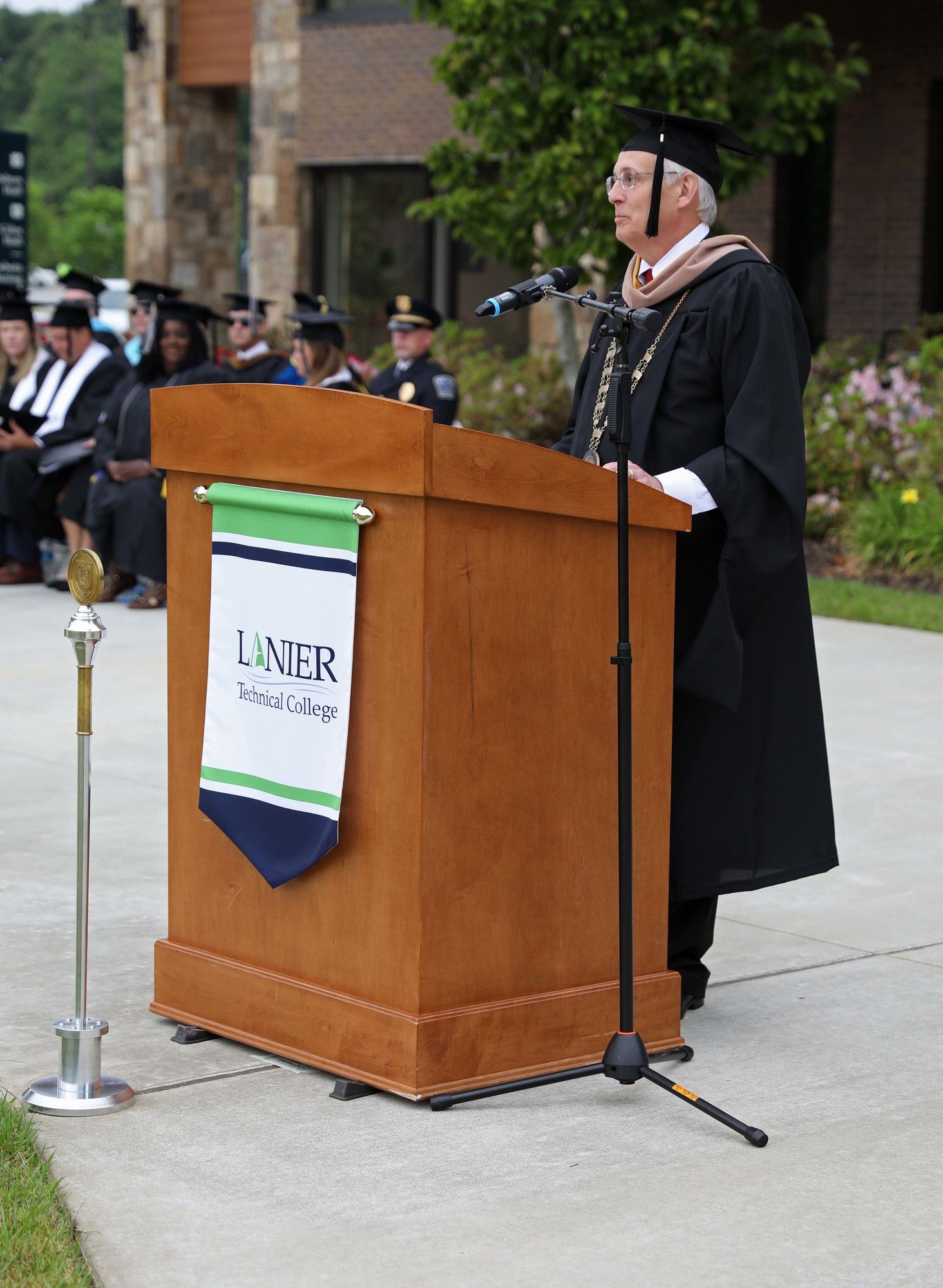 Tim McDonald addressing graduates at 56th Annual Commencement Ceremony