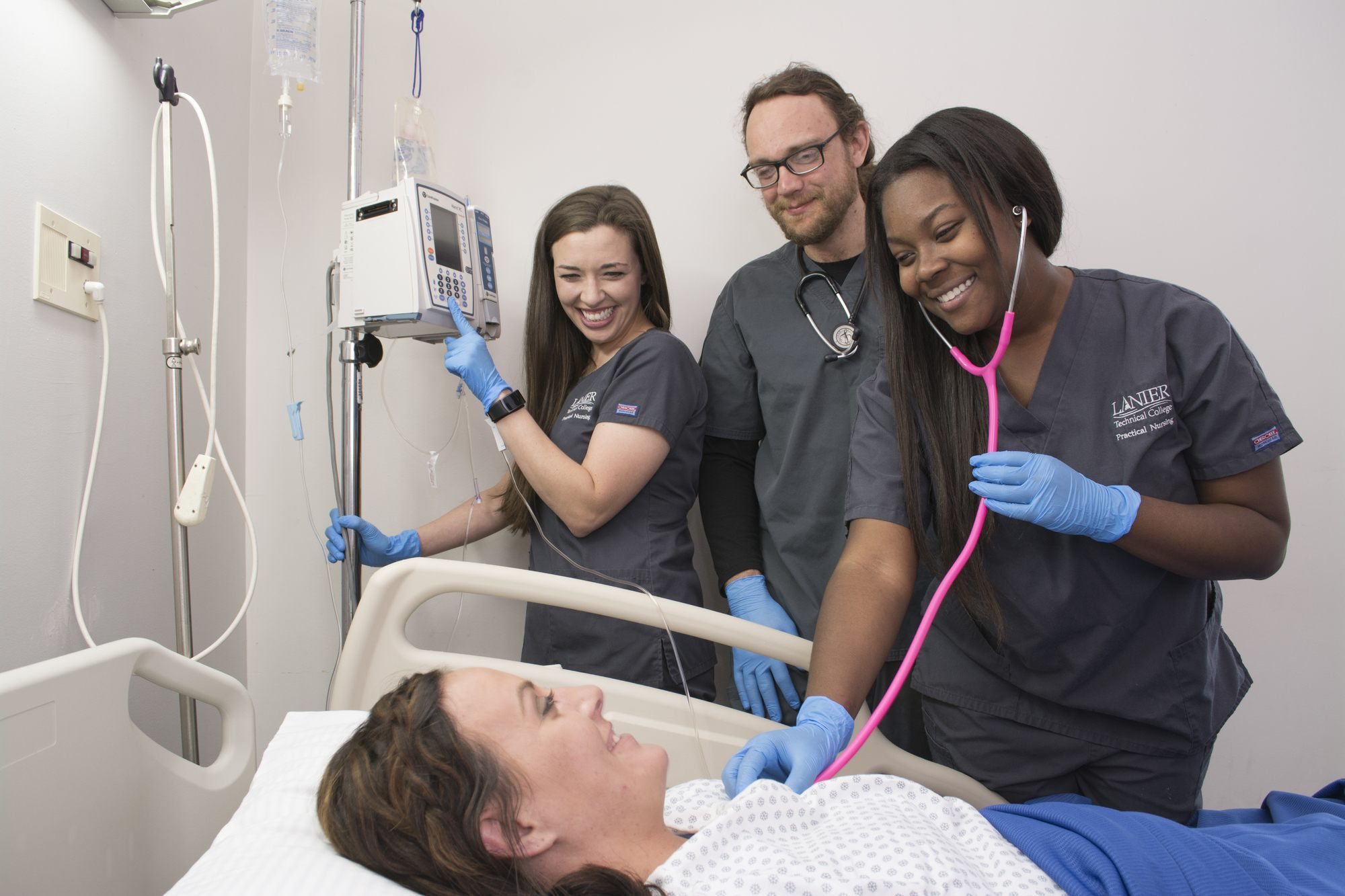 Radiologic Technology students looking at equipment