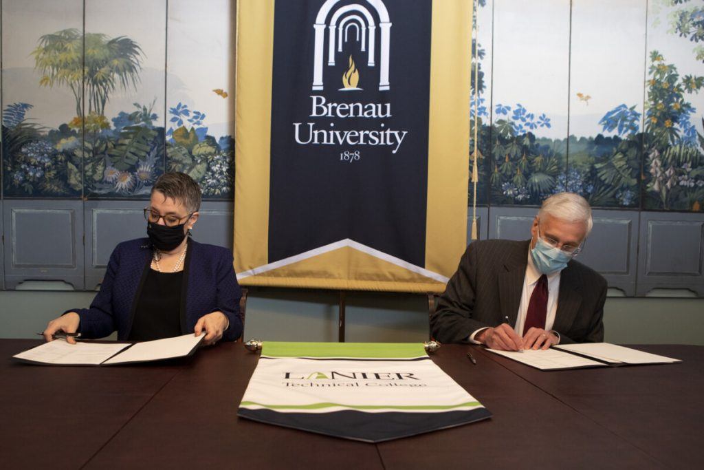 Lanier Technical College and Brenau University have collectively signed a program articulation agreement