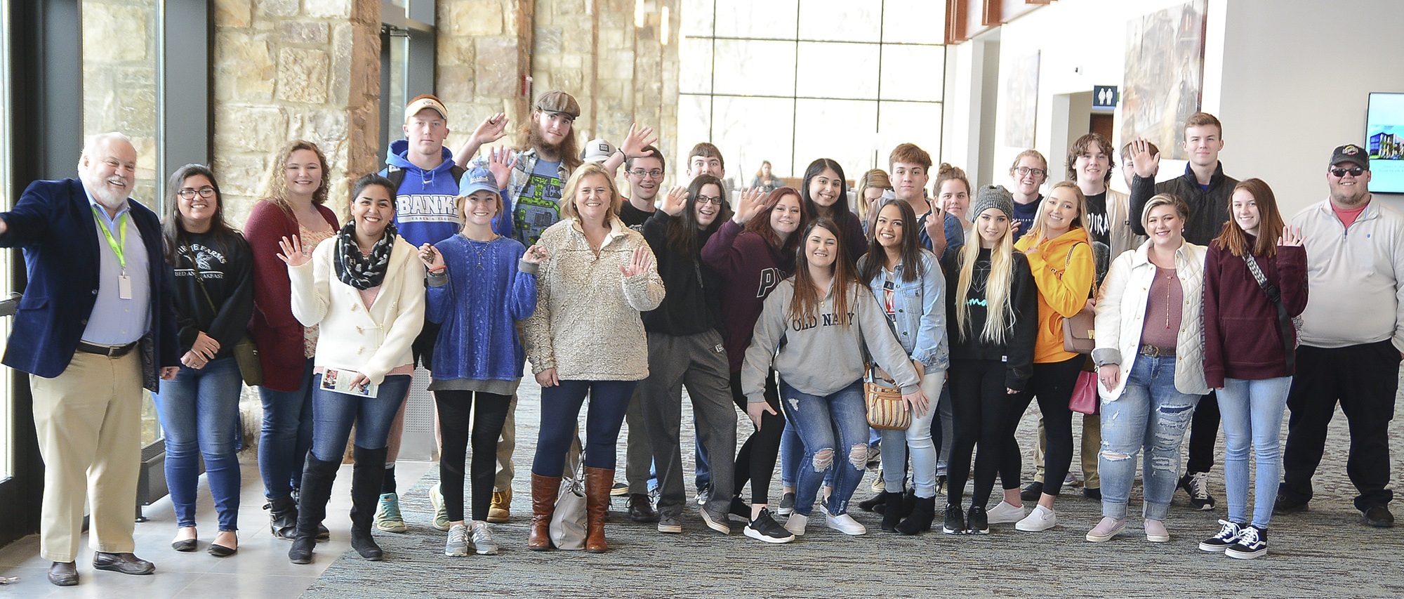 group of students in lobby of conference center