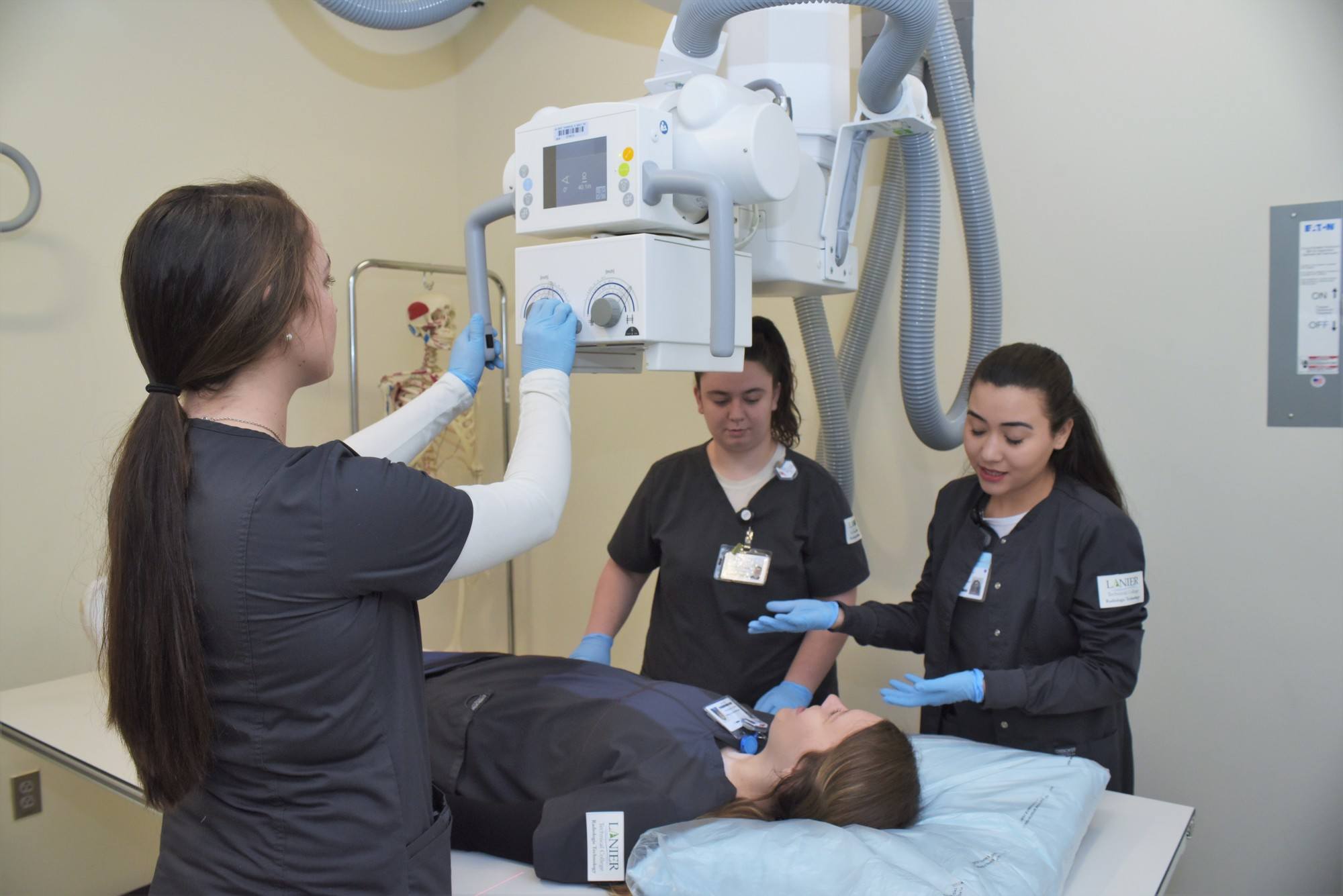 Radiologic Technology students using equipment