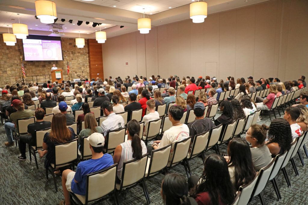 Dual Enrollment Orientation students sitting in conference room