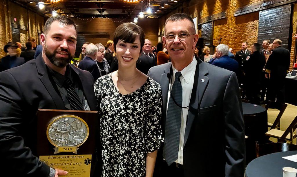 Lanier Tech's Brandon Carey with wife, Susanna, and mentor Lanier Swofford.