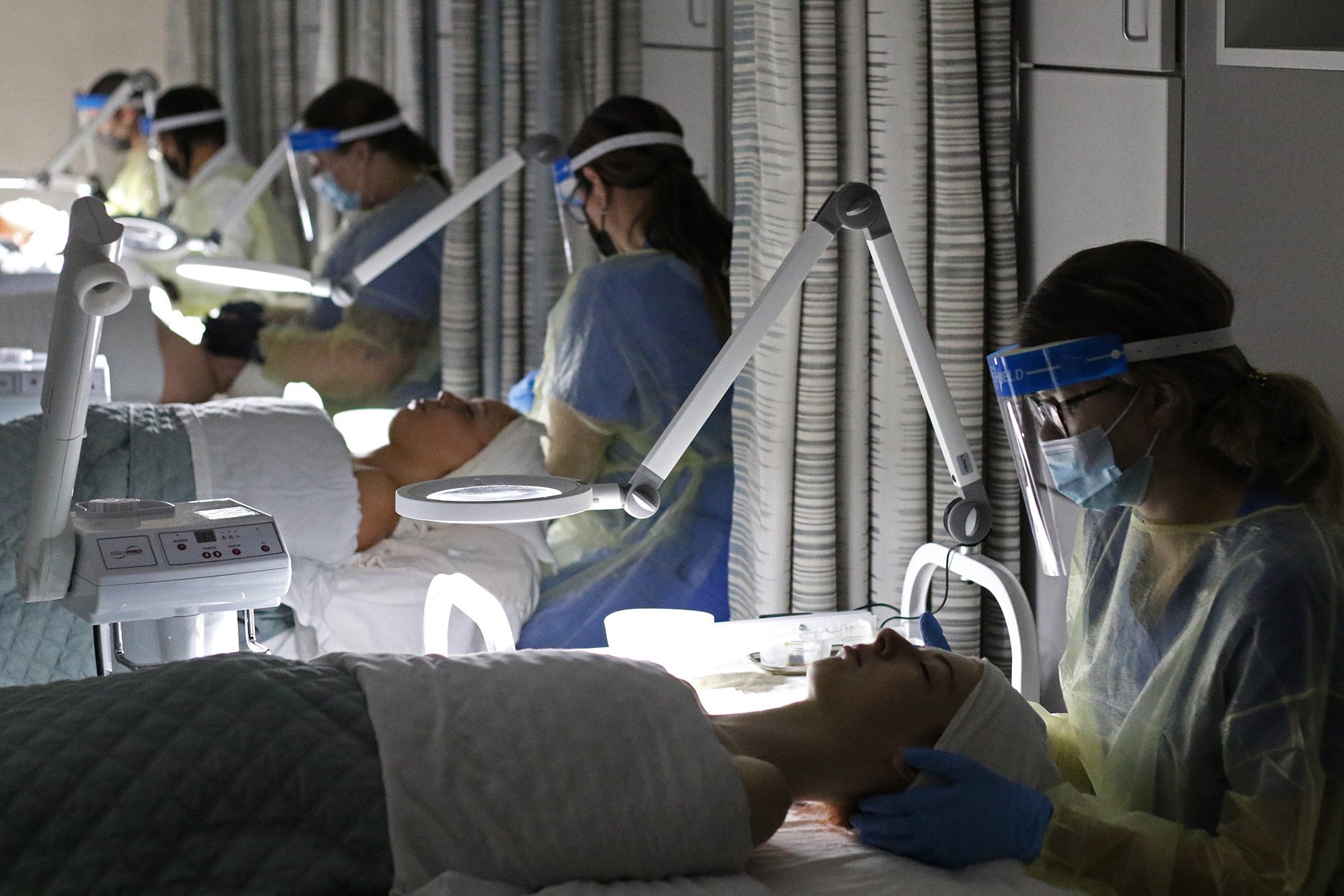 Radiologic Technology students looking at equipment